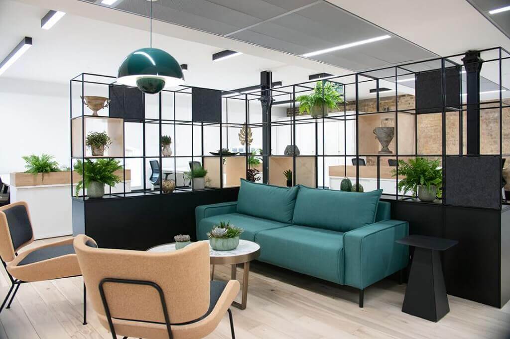 Corporate office that has been converted into a hybrid workplace that encourage employees to meet and work together