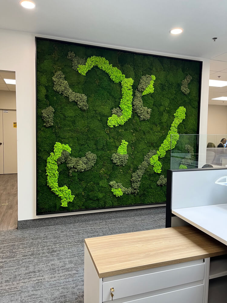 green wall art in office