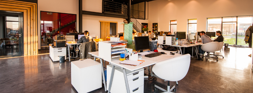 Creative office with desks and office chairs